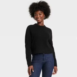 Black crewneck sweater